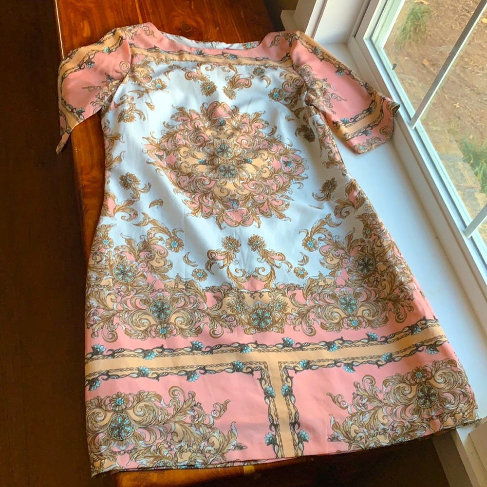 Scarlet 1/2 slv dress. Very interesting pattern and eye catching. Zip down back.